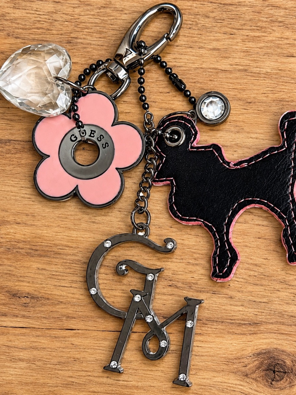 GUESS Pink Flower & Black Dog Charm Bag Keychain with Crystal Accents
